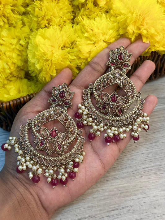 Maroon statement earrings