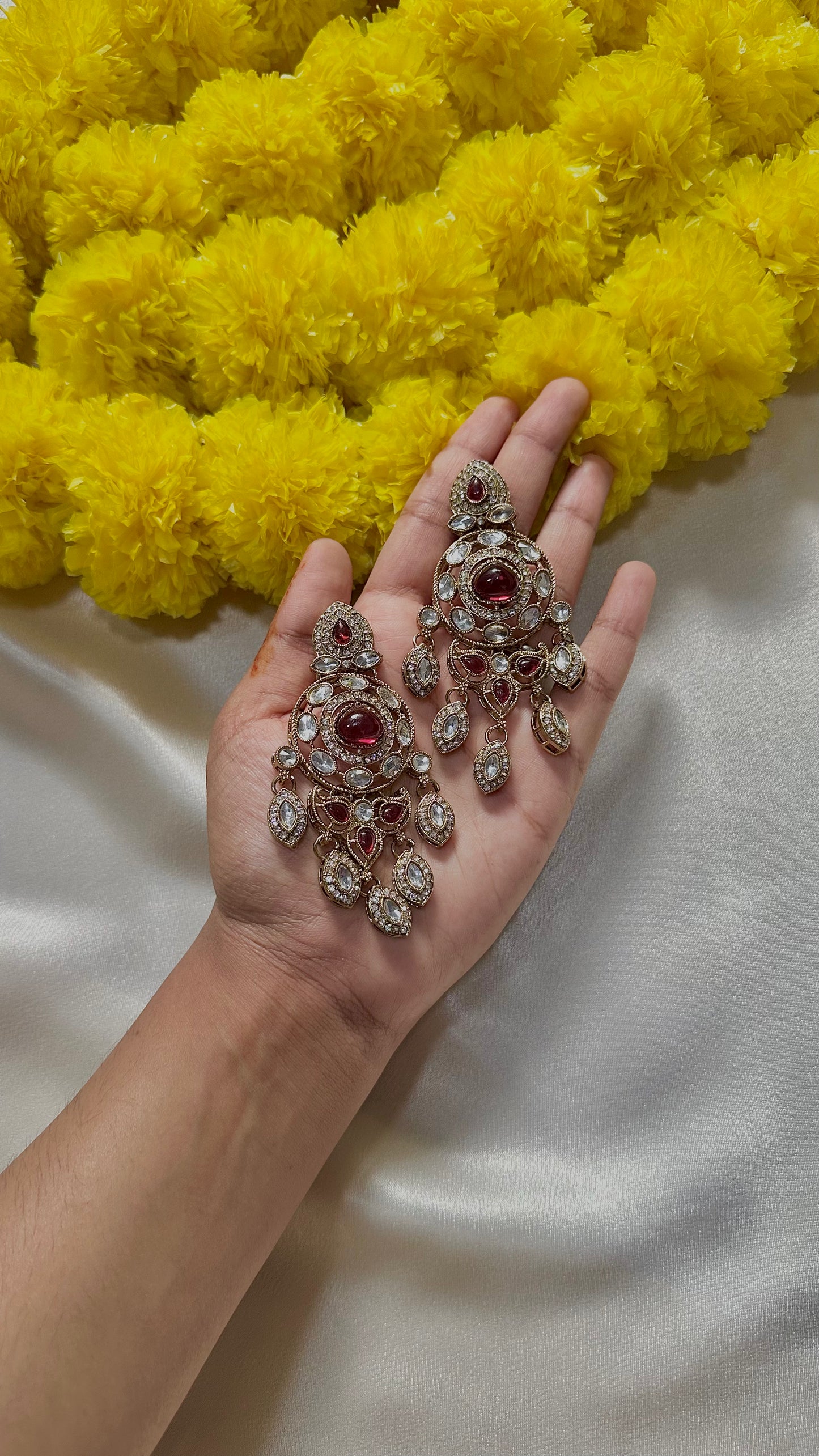 Maroon statement earrings