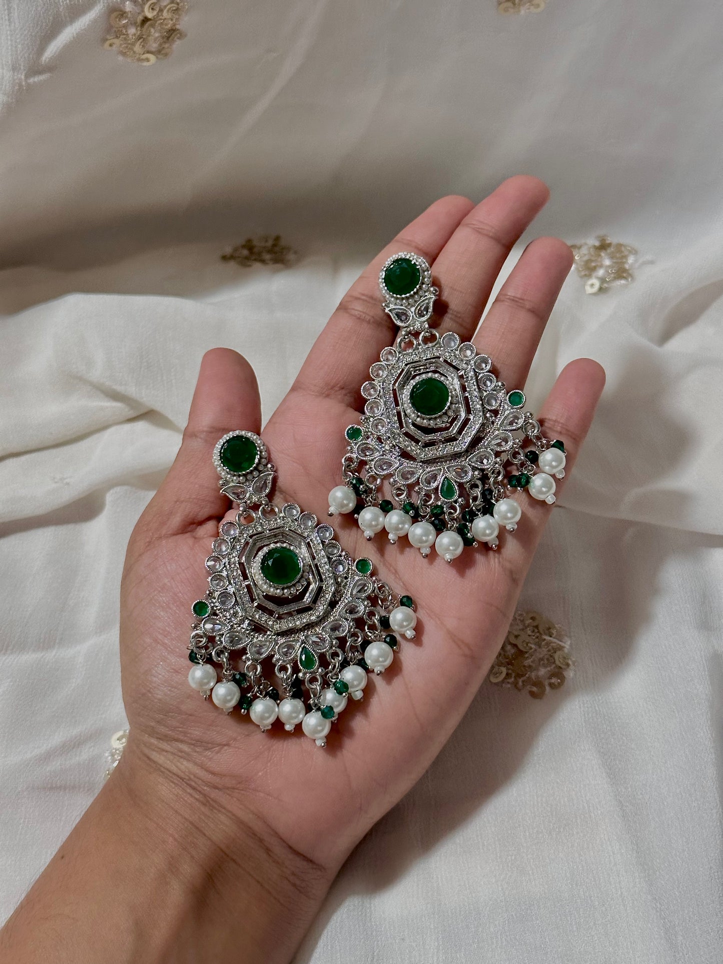 Emerald diamond cut silver earrings