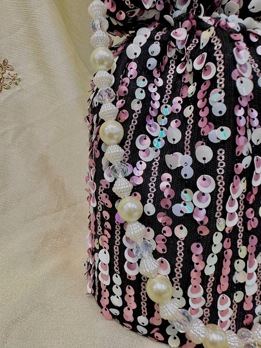 Shades of pink sequins potli