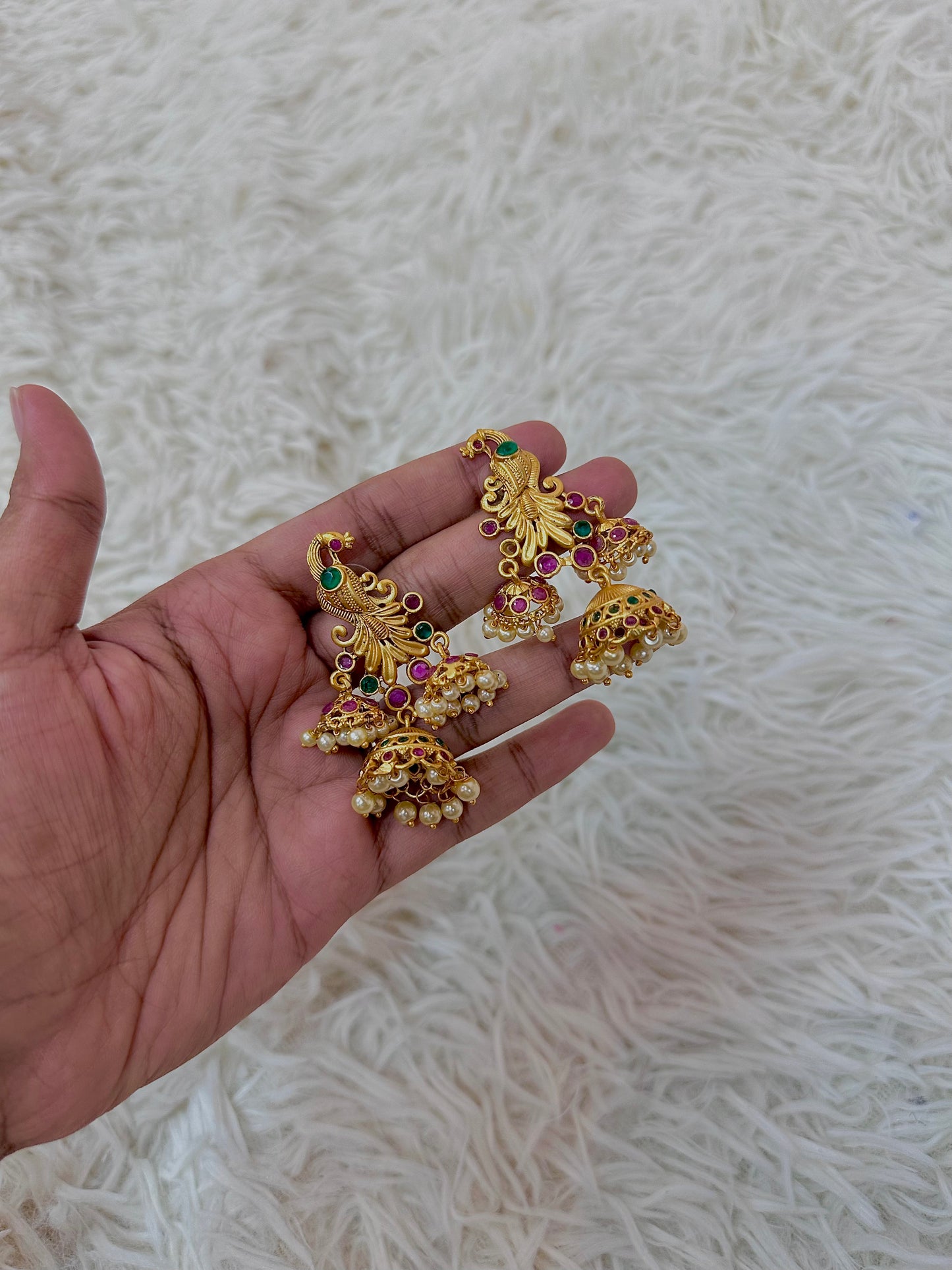 Peacock yellow gold earrings