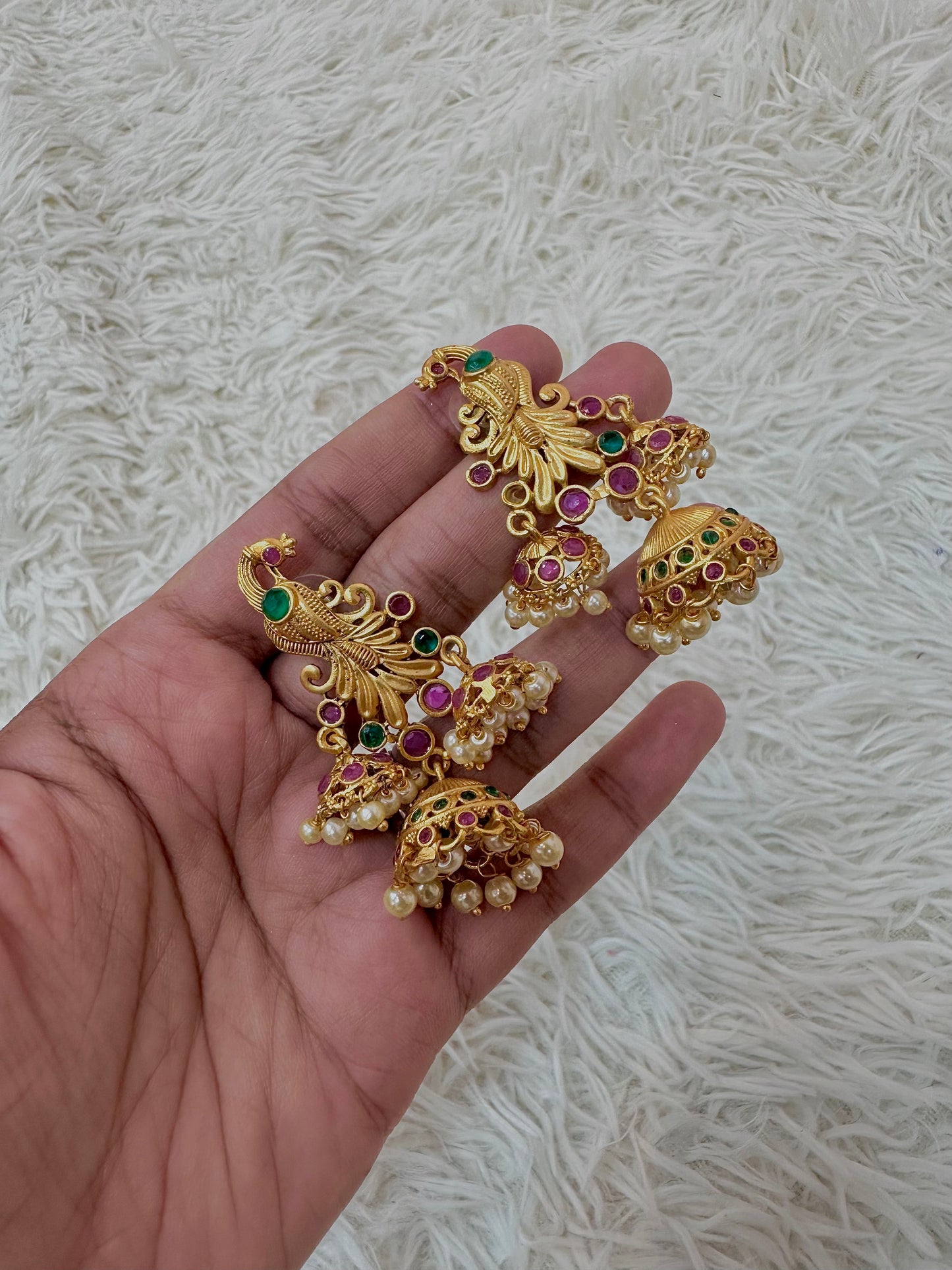 Peacock yellow gold earrings