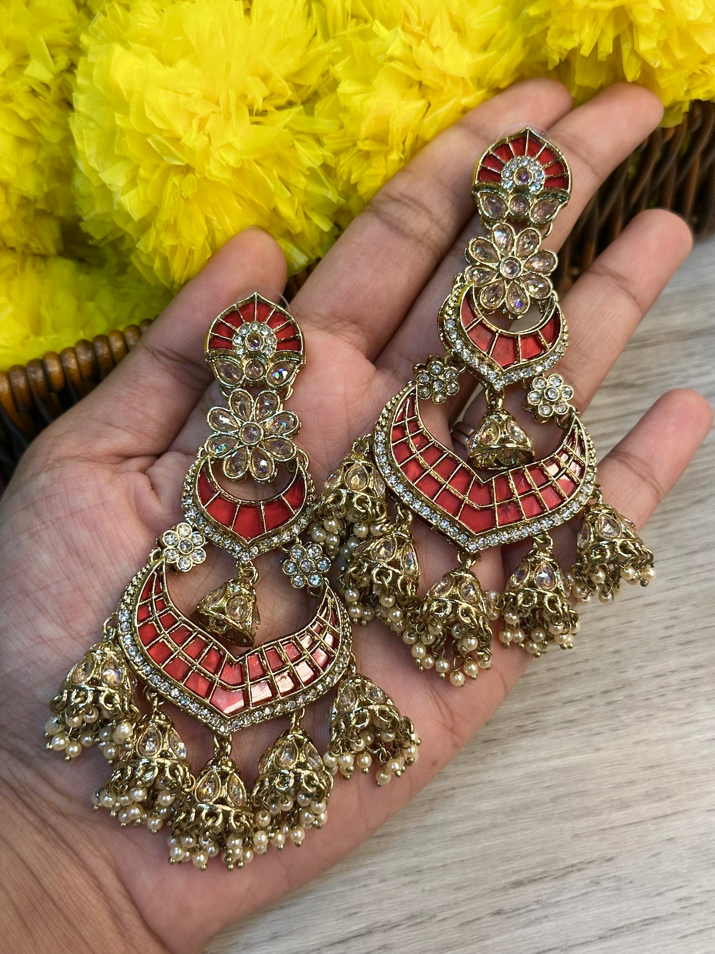 Red statement earrings