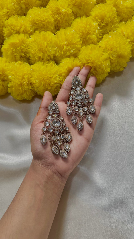 White statement earrings