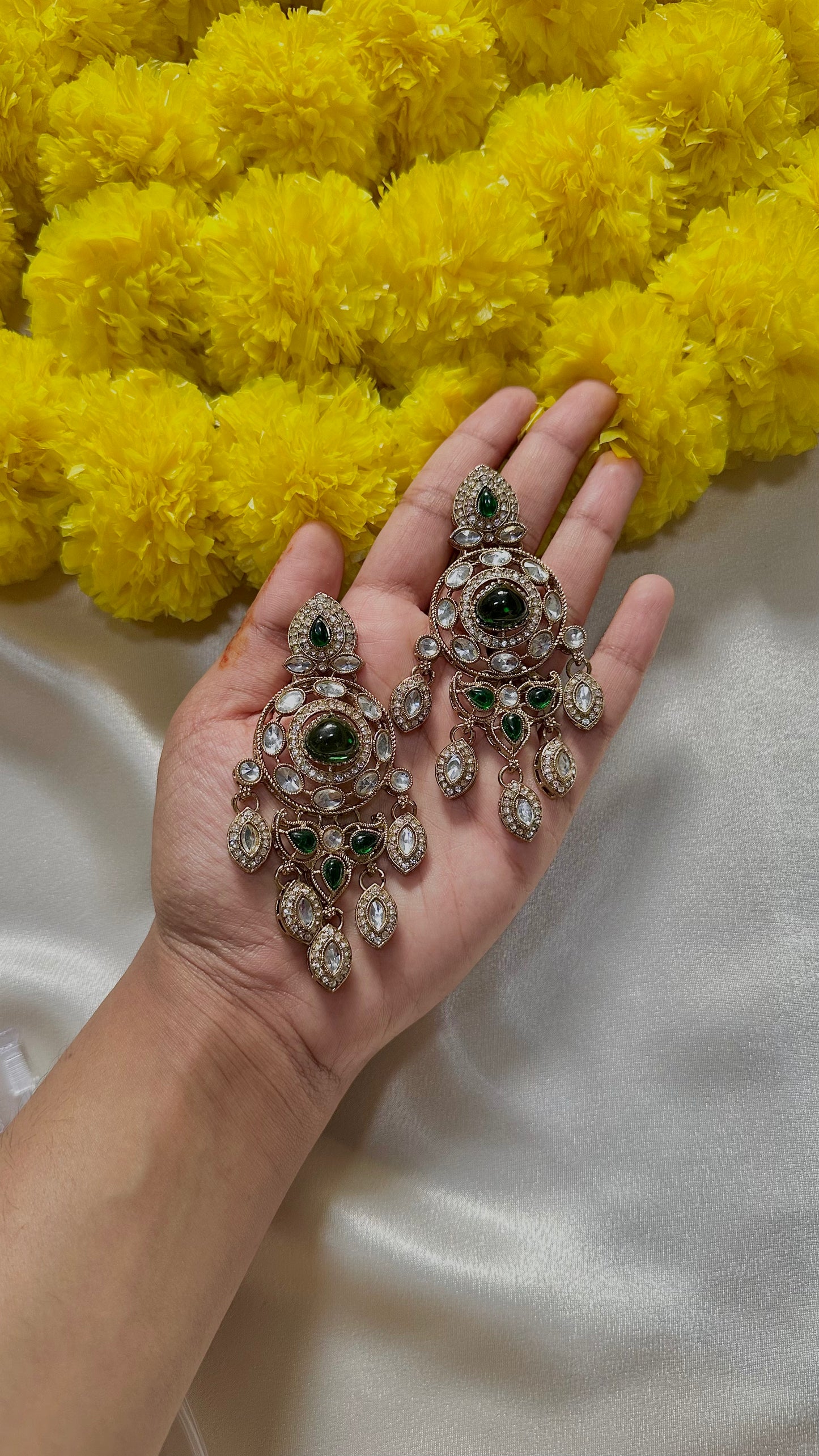 Emerald statement earrings