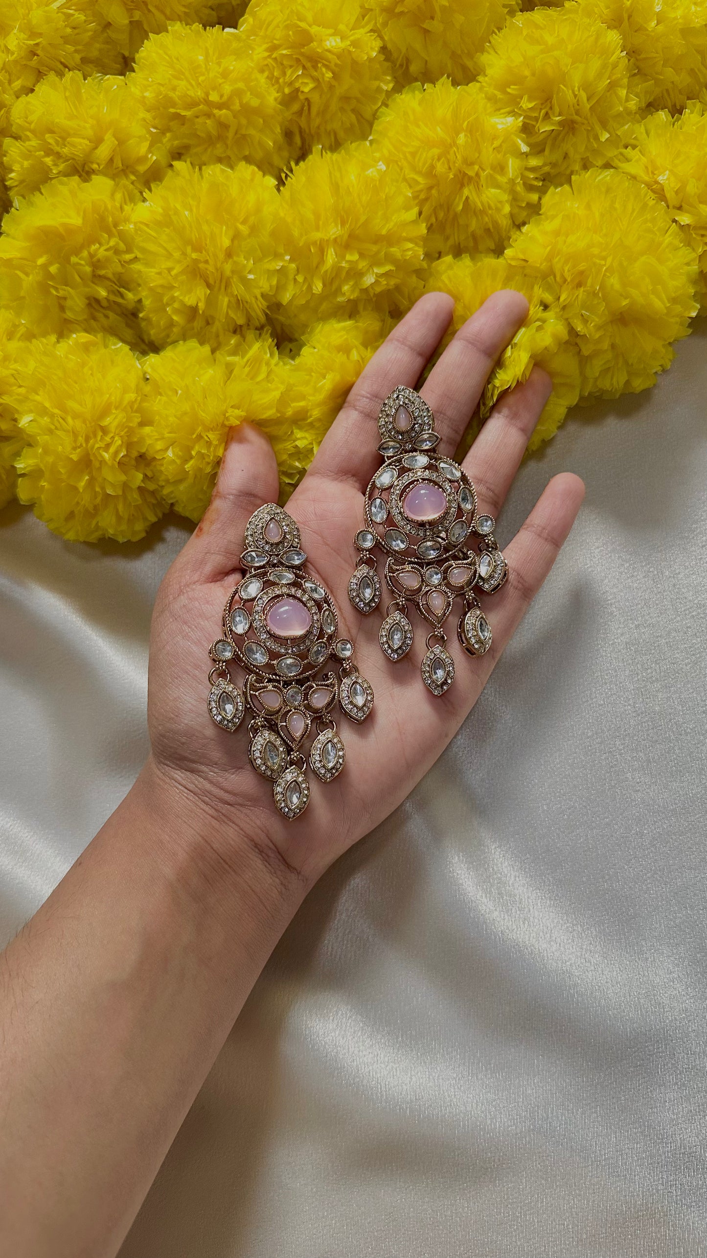 Baby pink statement earrings