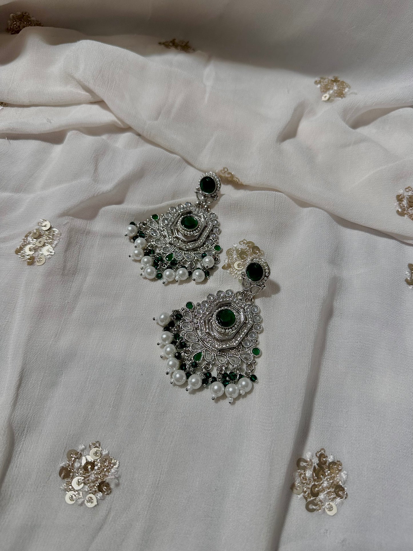 Emerald diamond cut silver earrings