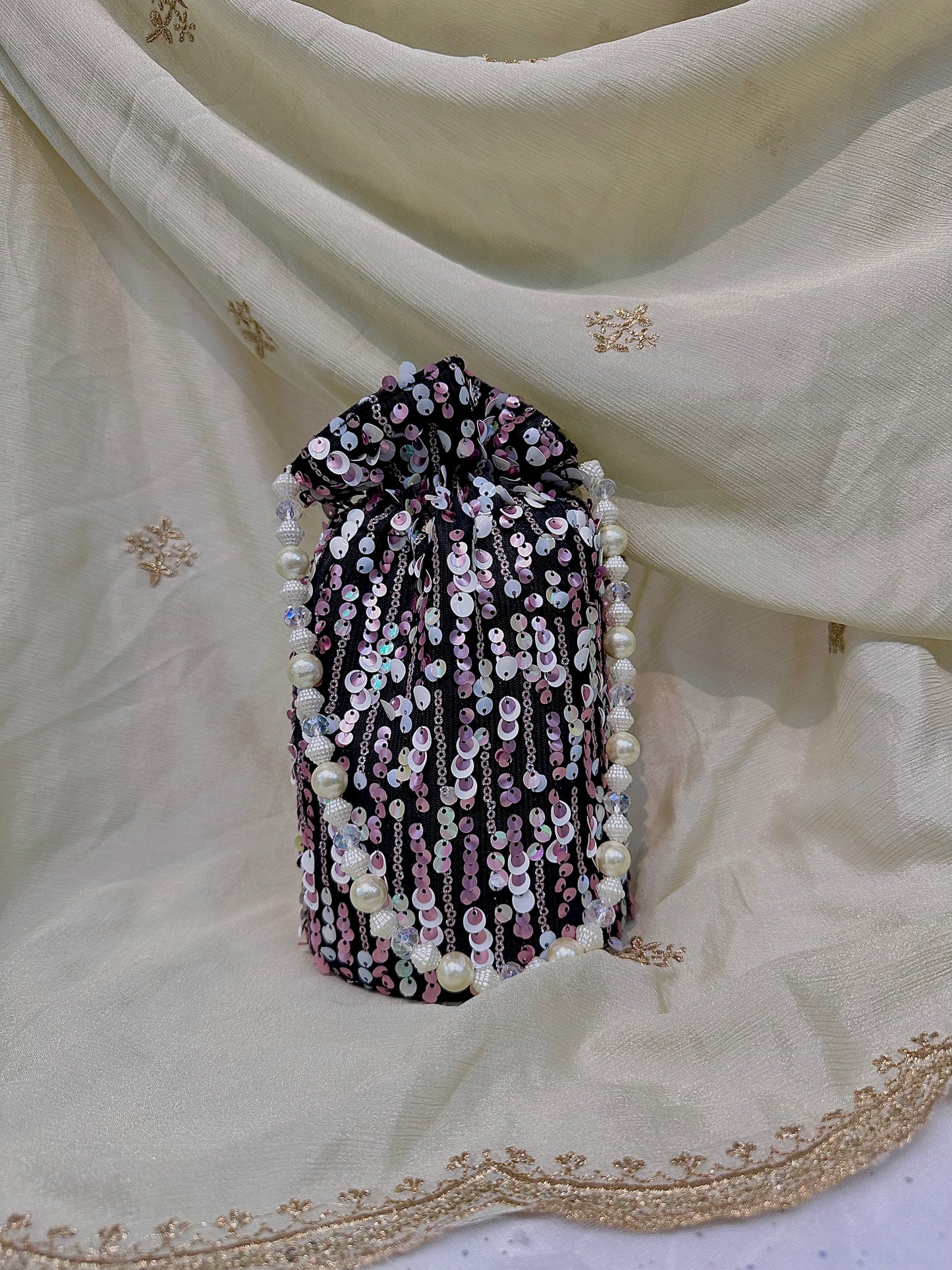 Shades of pink sequins potli