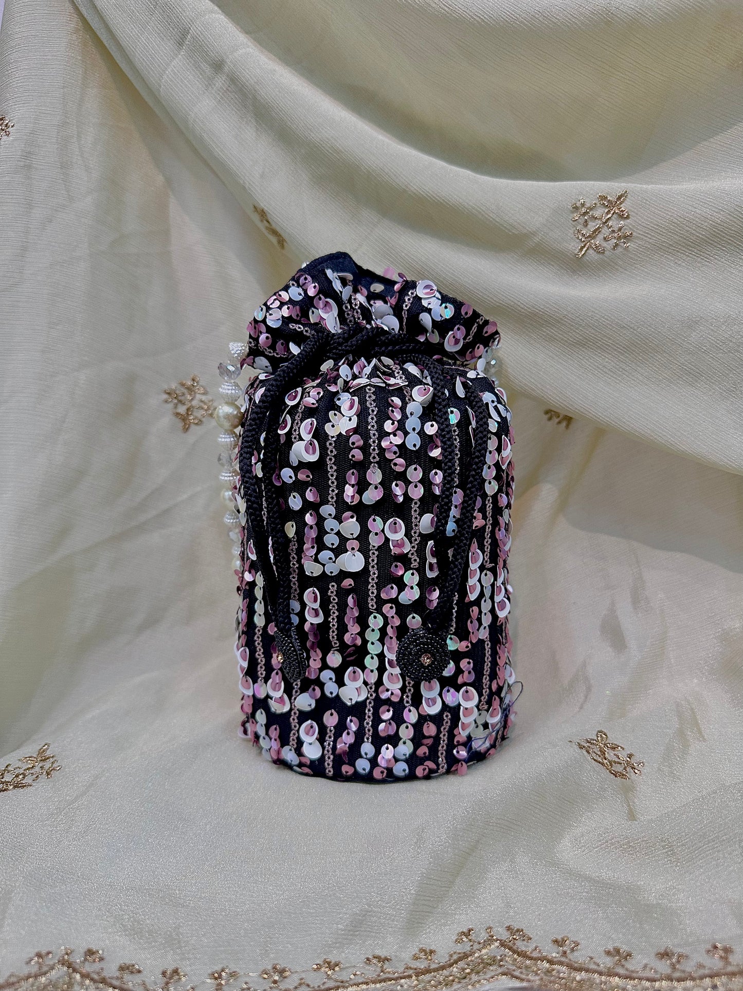 Shades of pink sequins potli