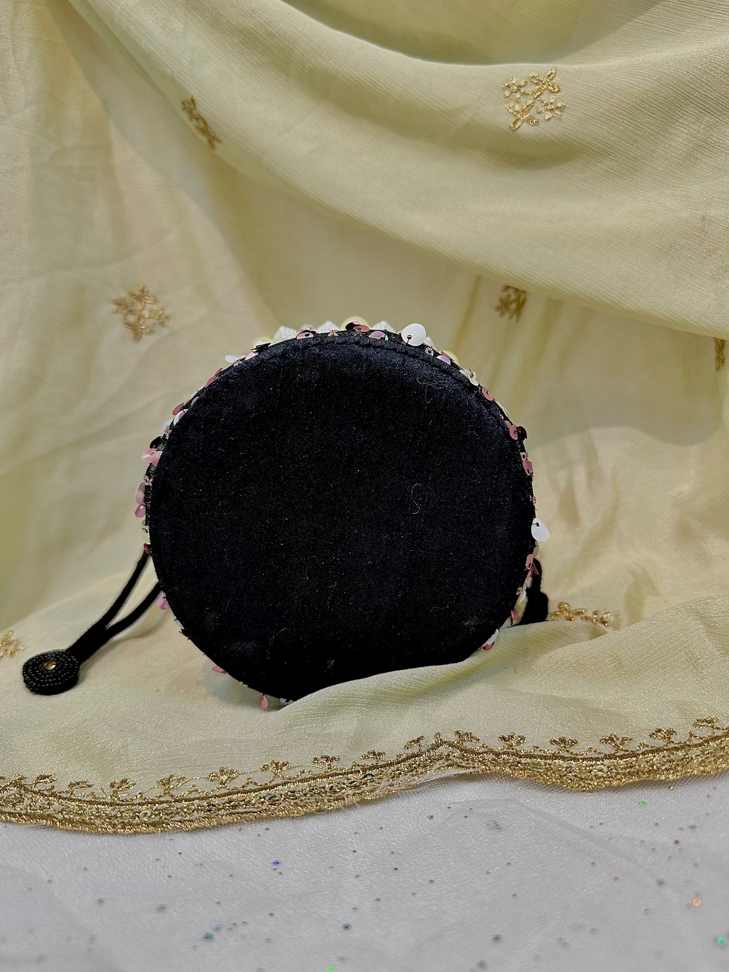 Shades of pink sequins potli