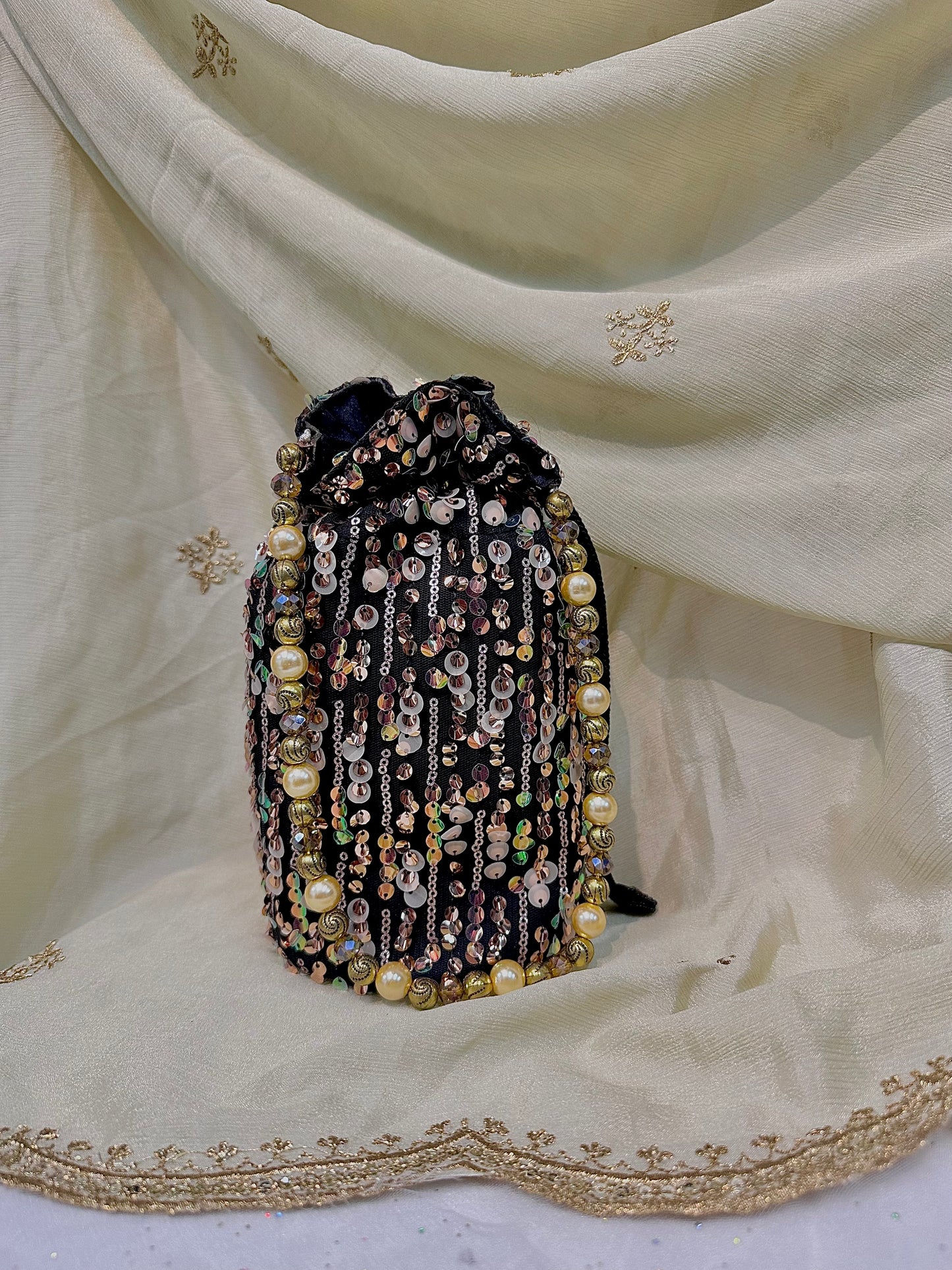 Shades of brown sequins potli