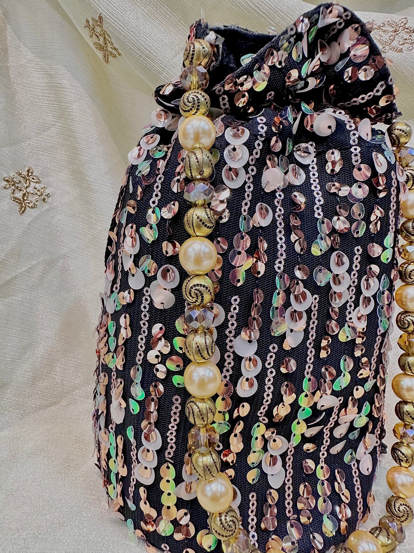 Shades of brown sequins potli