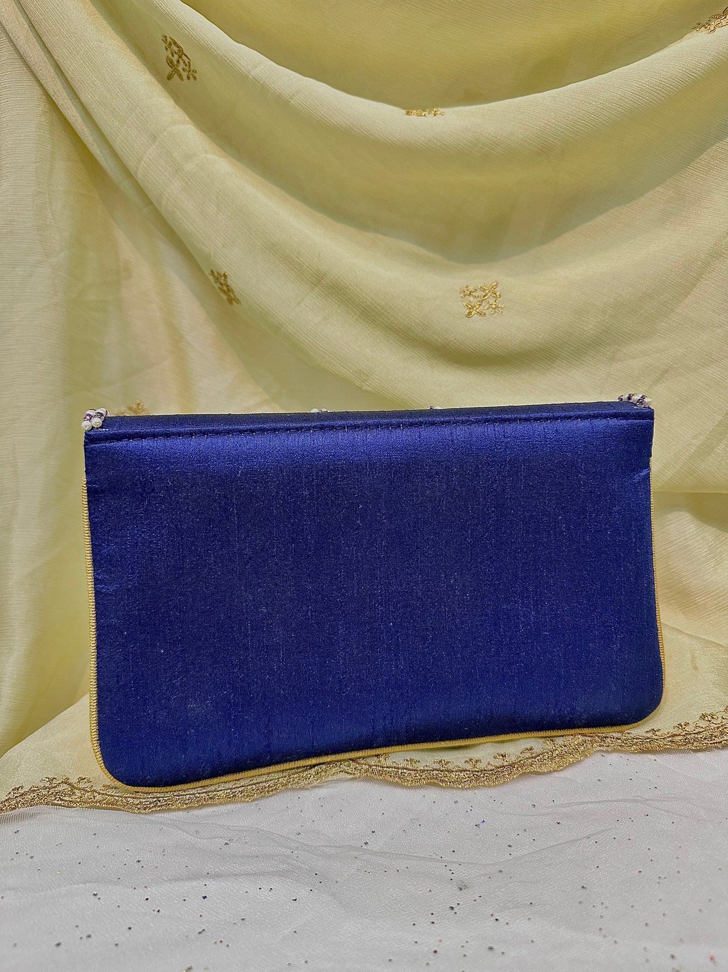 Blue seashell clutch