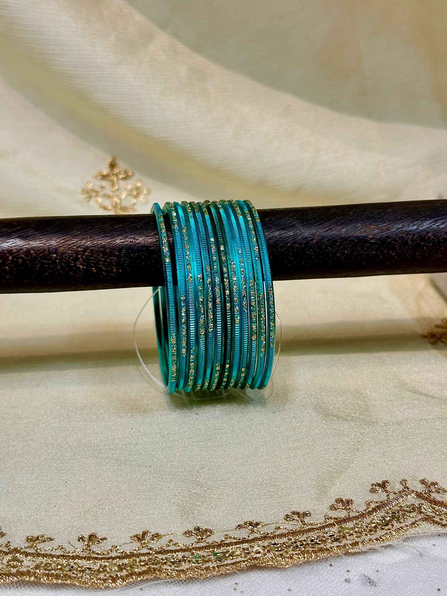 2.4 teal green metallic bangles