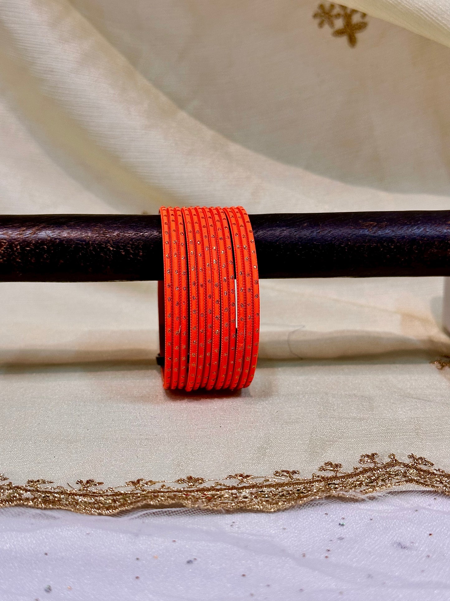 2.6 neon orange shimmer bangles